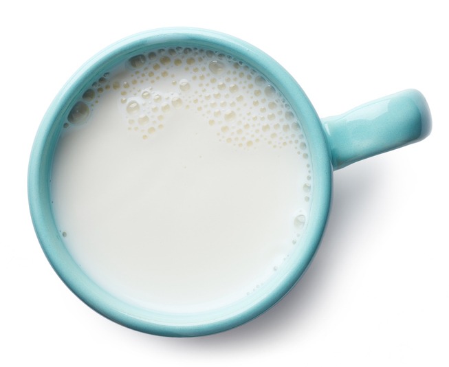 Glass of milk with bubbles