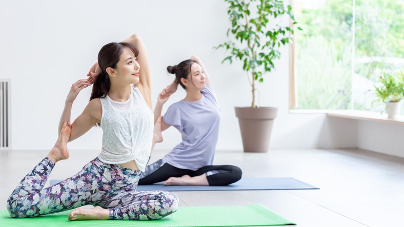 attractive japanese women exercising in the living room