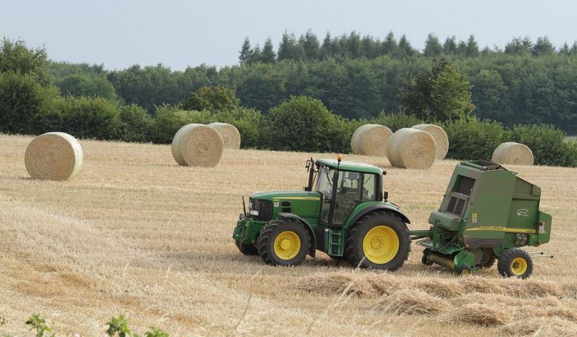 baler attached to a tractor