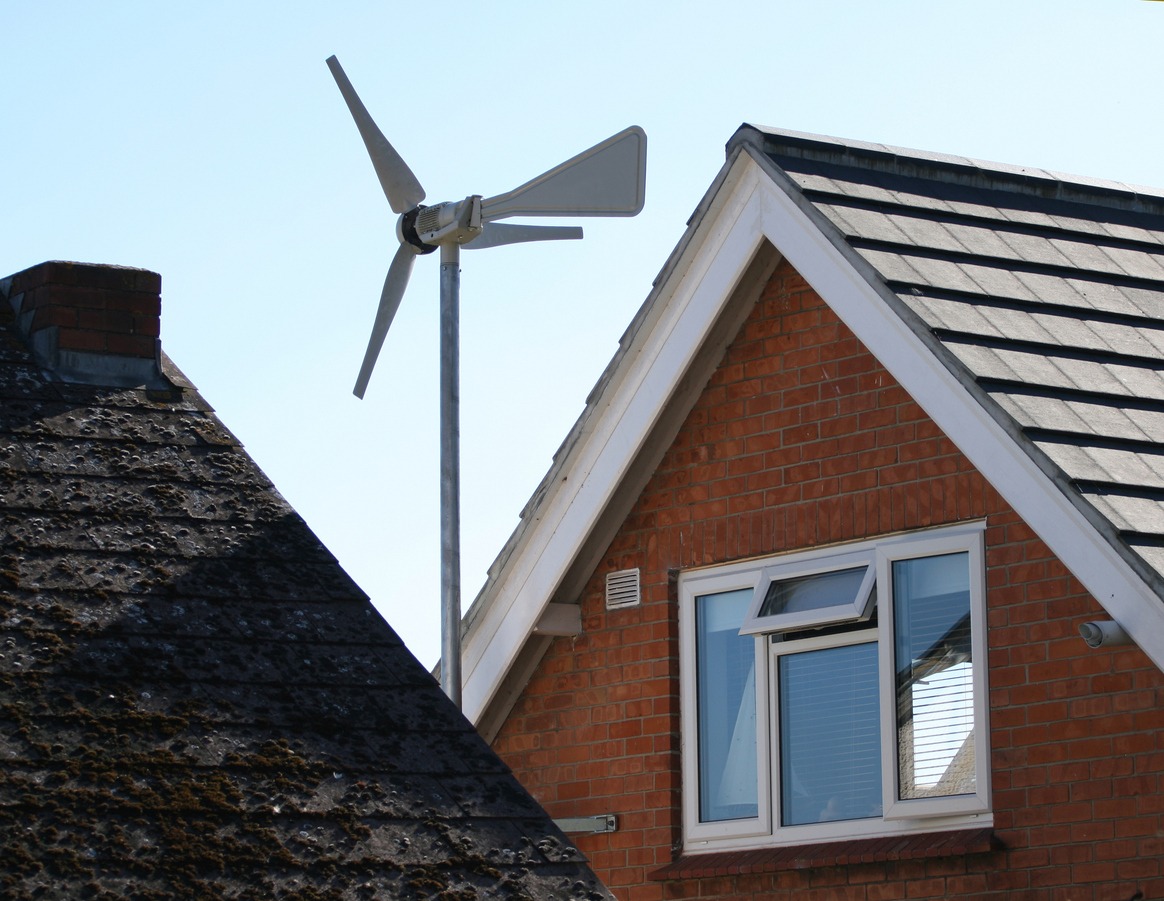 Wind turbine generator on house roof