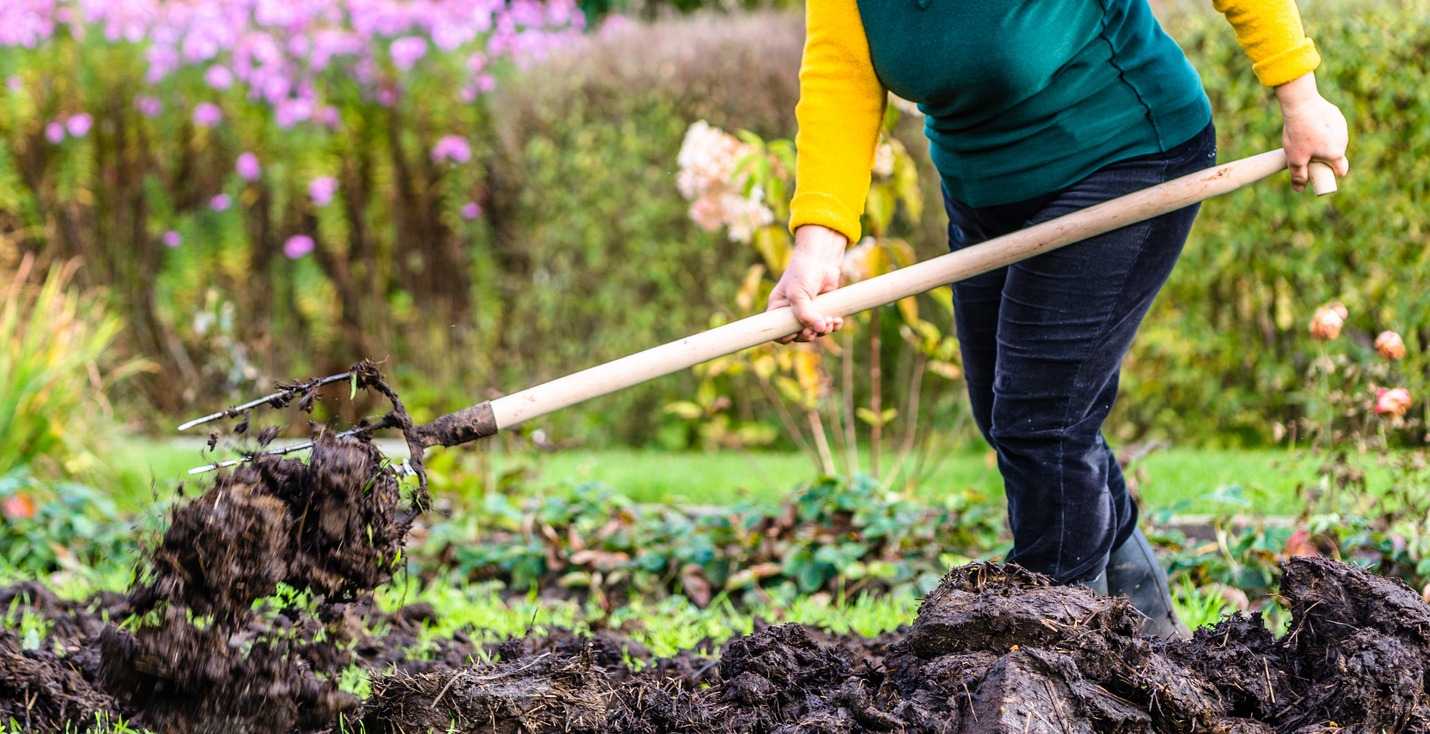 a farmer working on an organic fertilizer 
