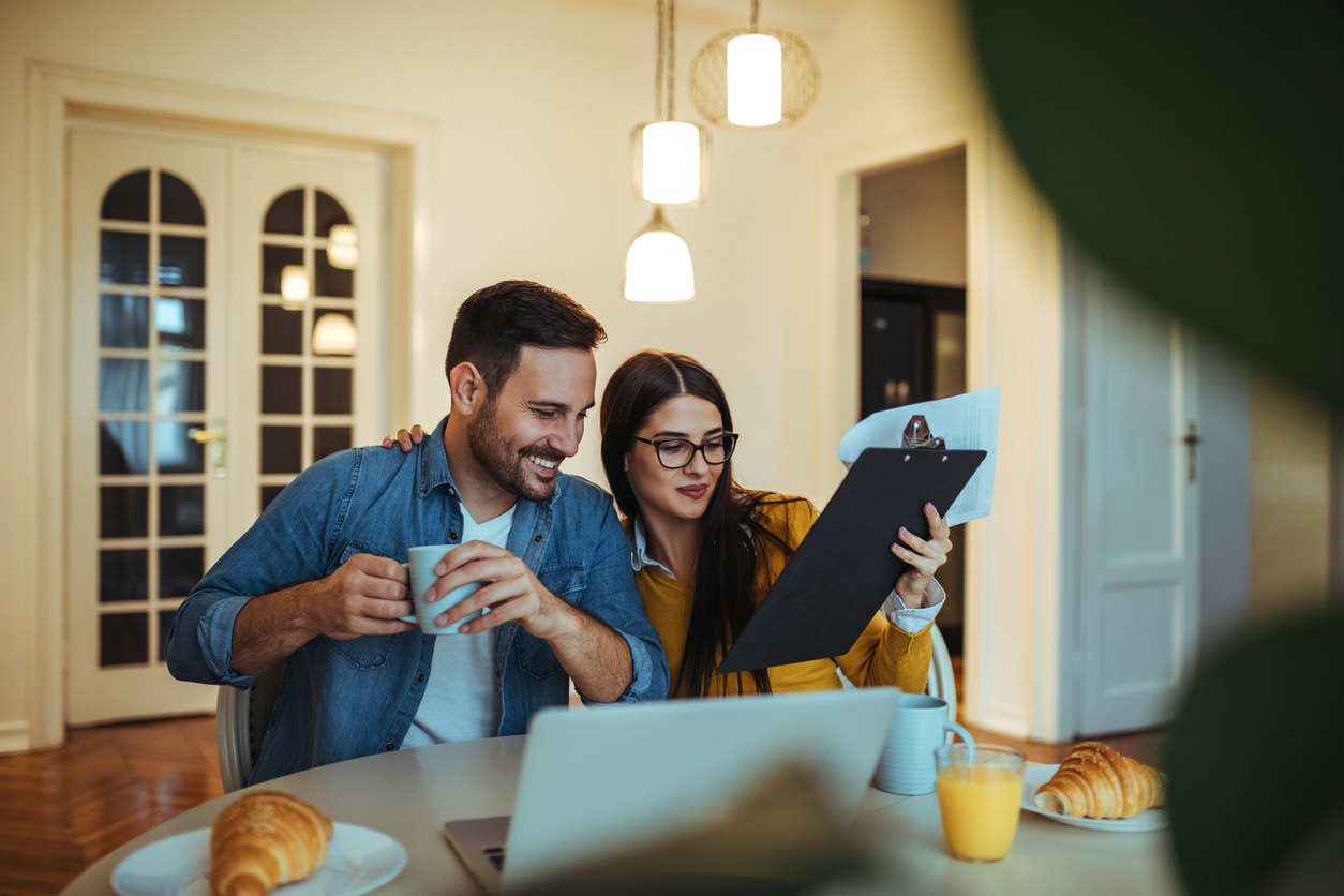 a couple going through a to-do list