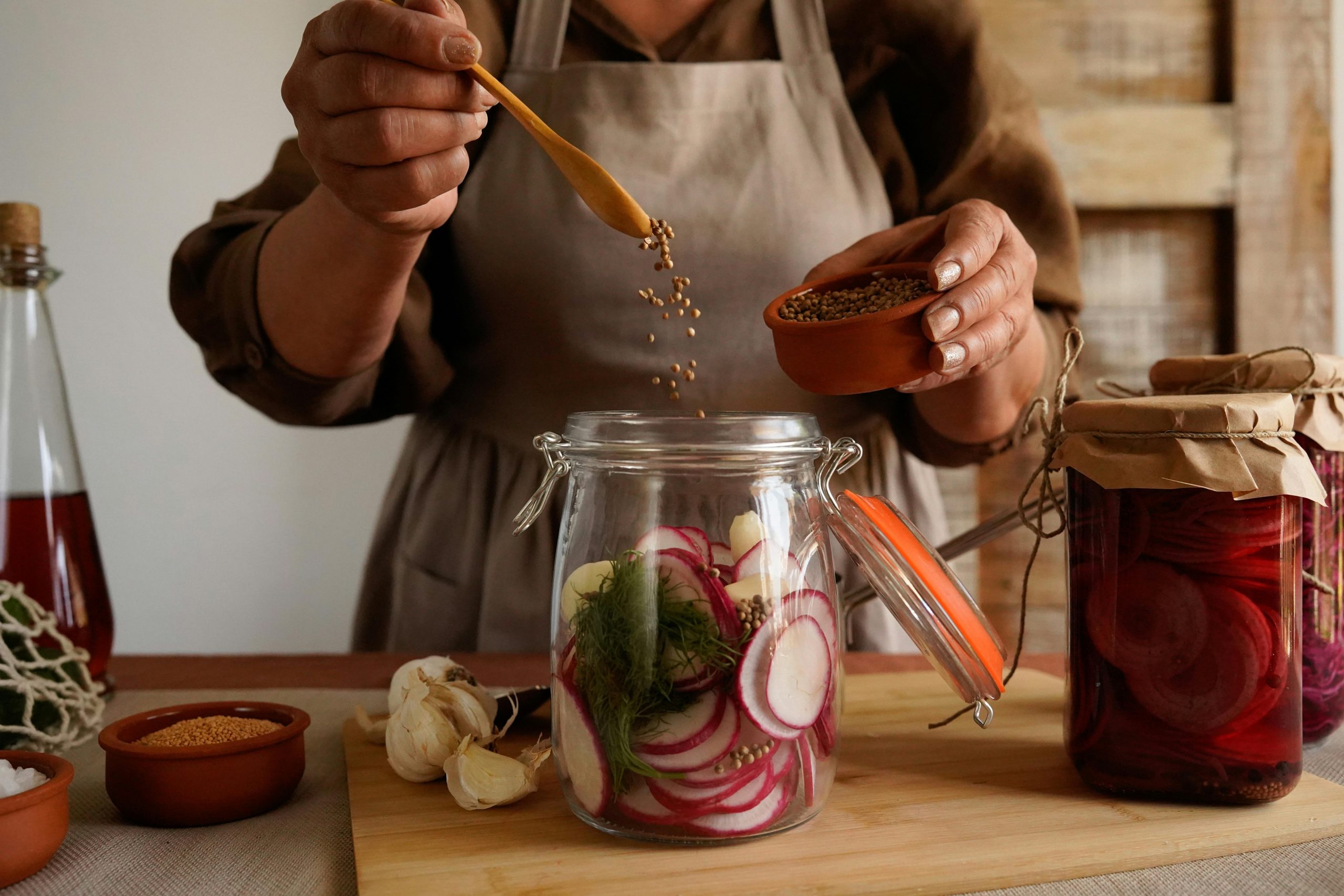 homemade pickling process in rustic kitchen