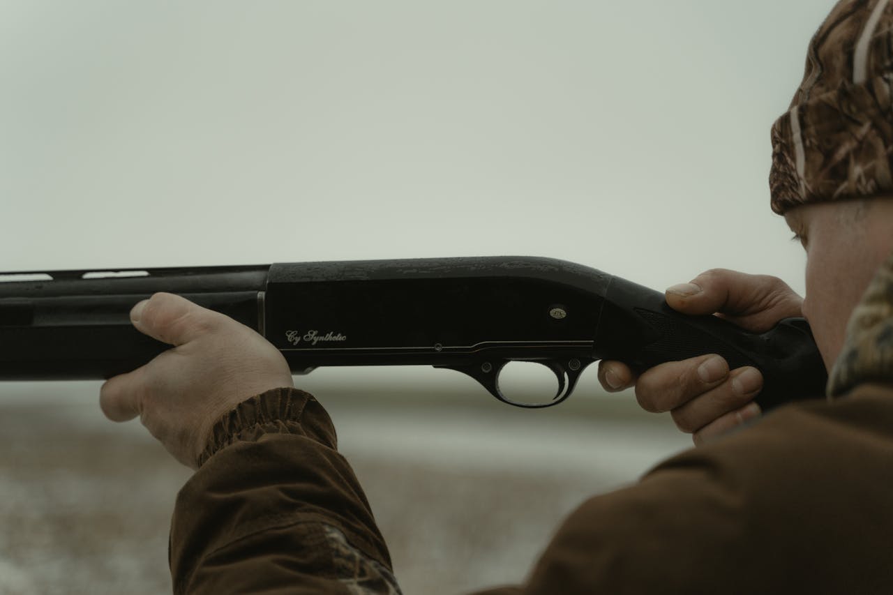 a man using his gun
