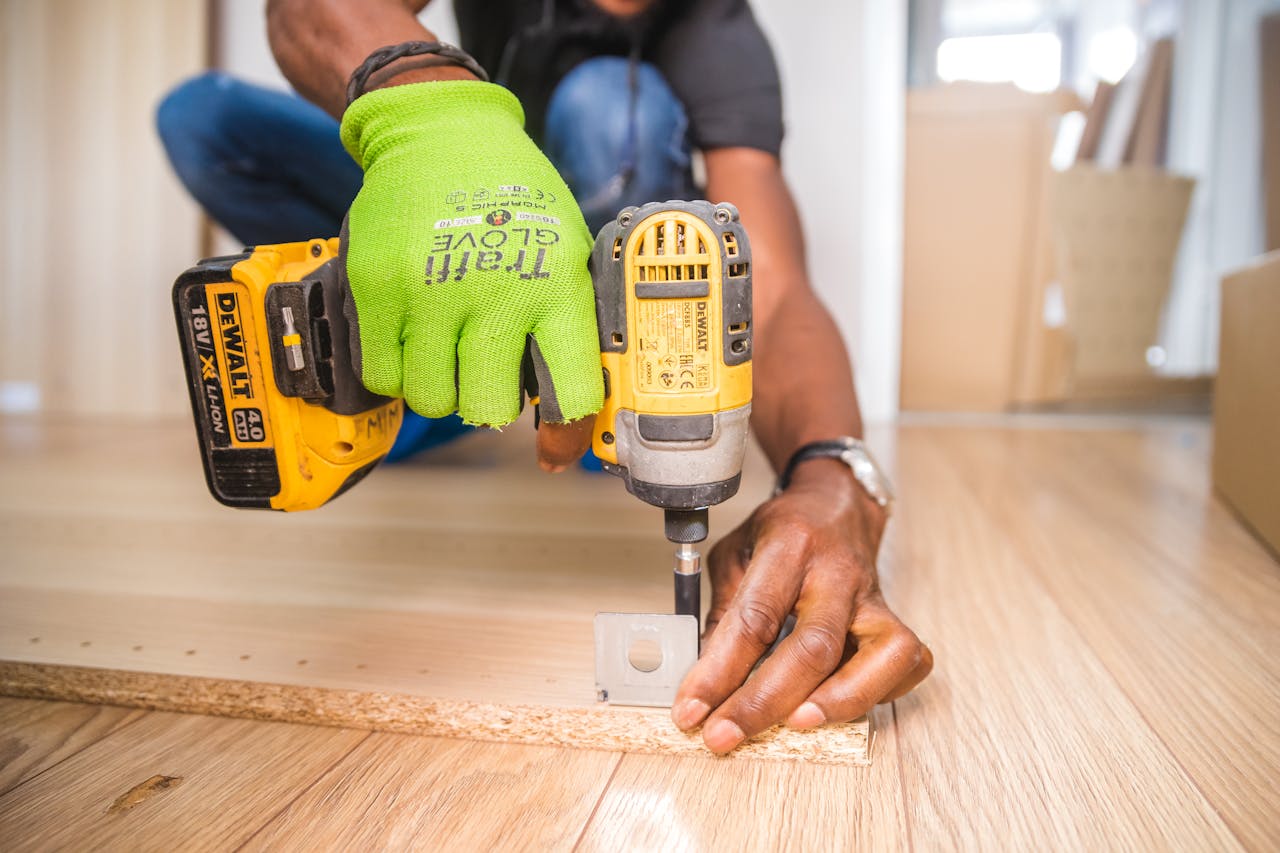 a man using a cordless drill