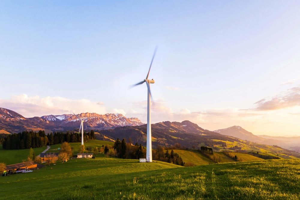 A windmill by the mountains
