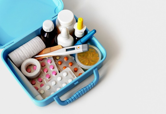 Home medical chest with medicine - pills, capsules, blisters, nose sprays, bottles