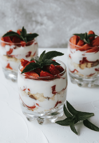 Strawberry trifle dessert in a trifle bowl