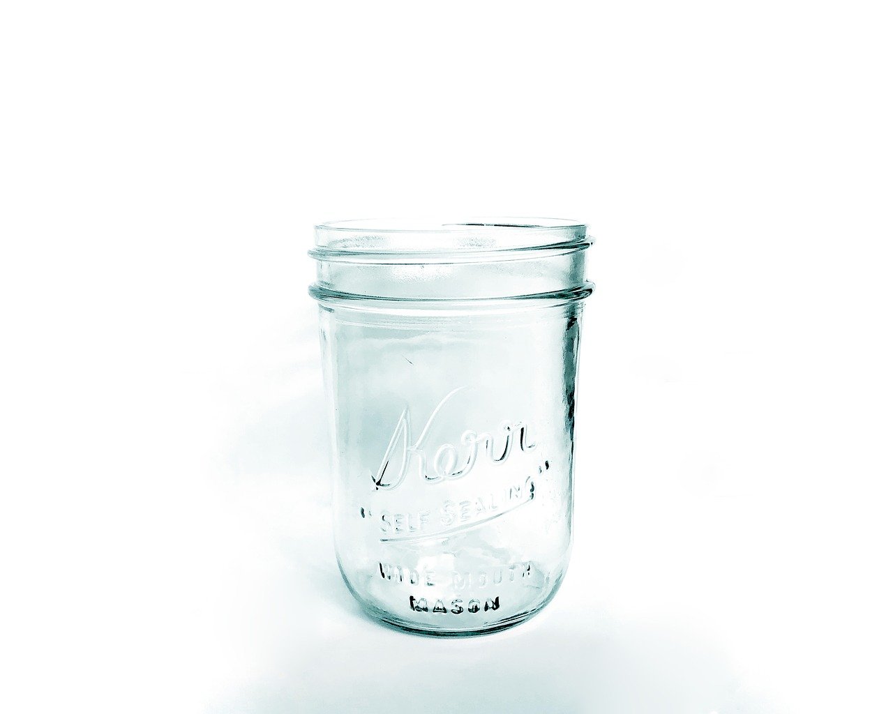fermented water kefir grains, glass jar