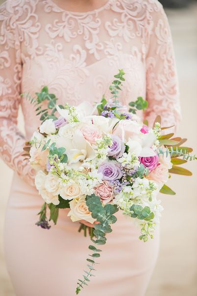 Rich tropical foliage and colorful flowers are typical beach wedding bouquets.